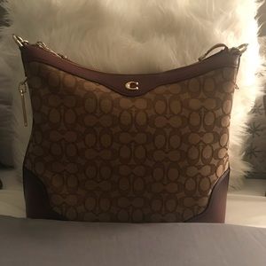 Burgundy and tan Coach purse